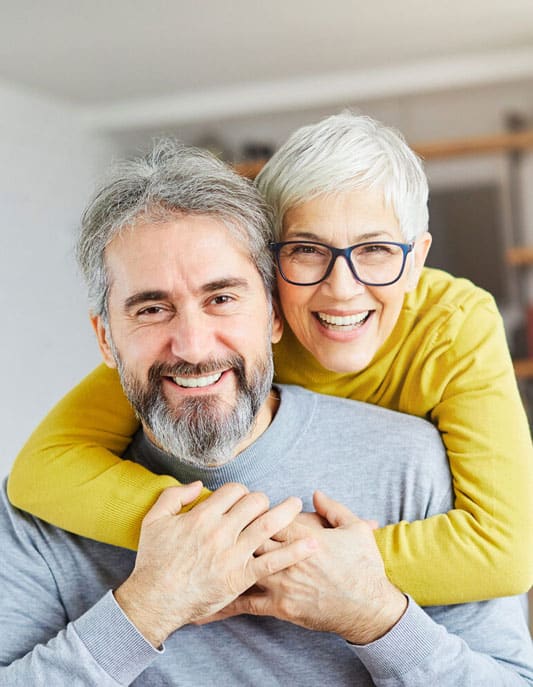 Old Couple After Dental Implants treatment in Fayetteville