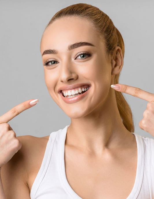 A girl after zoom teeth whitening in Fayetteville